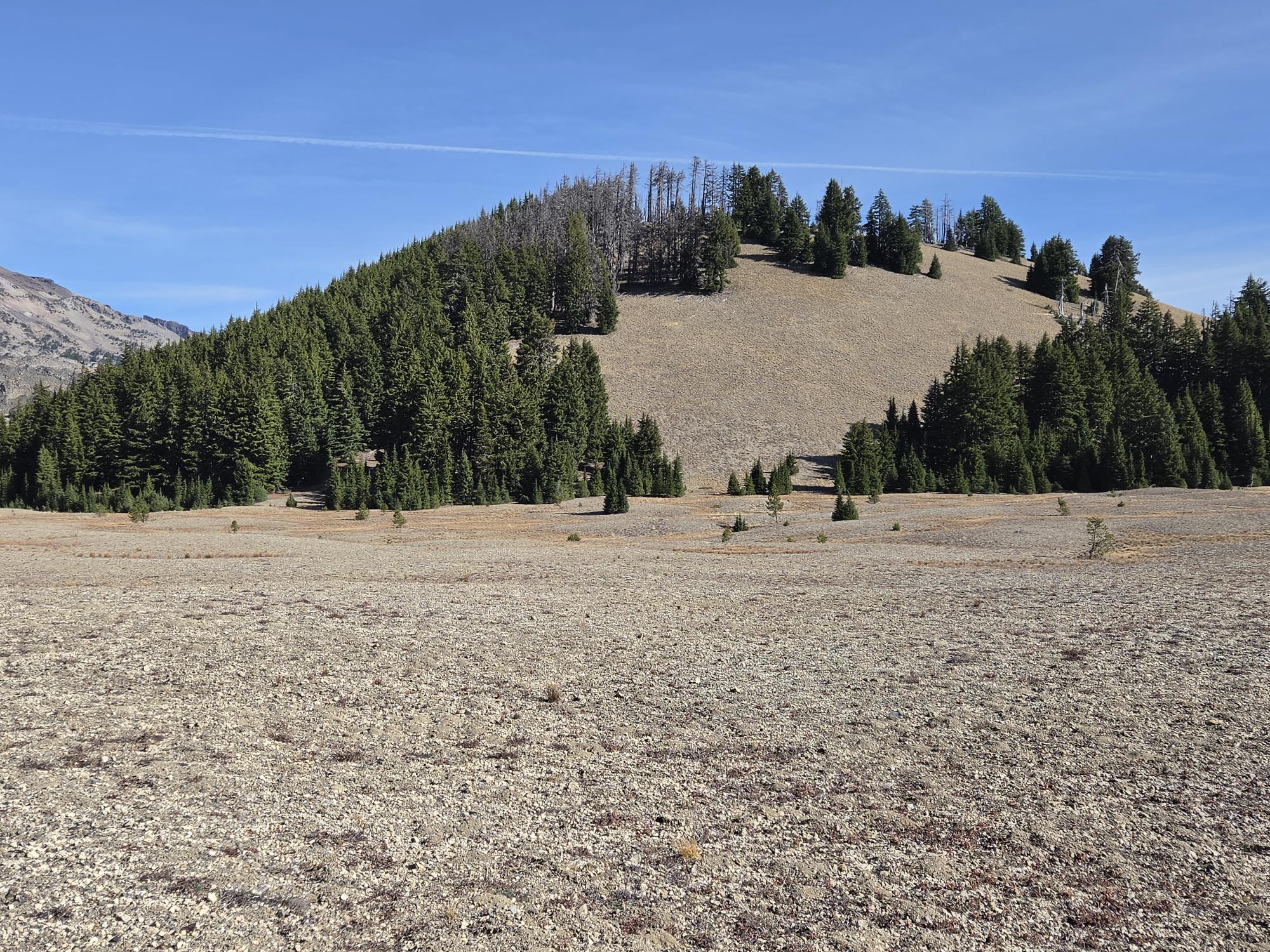 Le Conte Crater viewed across the dry volcanic landscape of Wickiup Plains in Central Oregon.